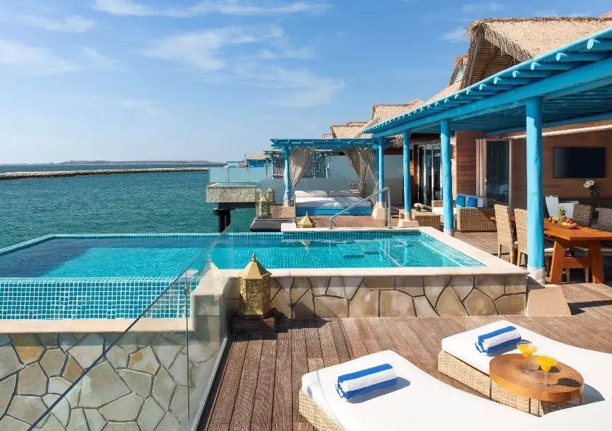 Overwater-villa stay: Private pools and butler.