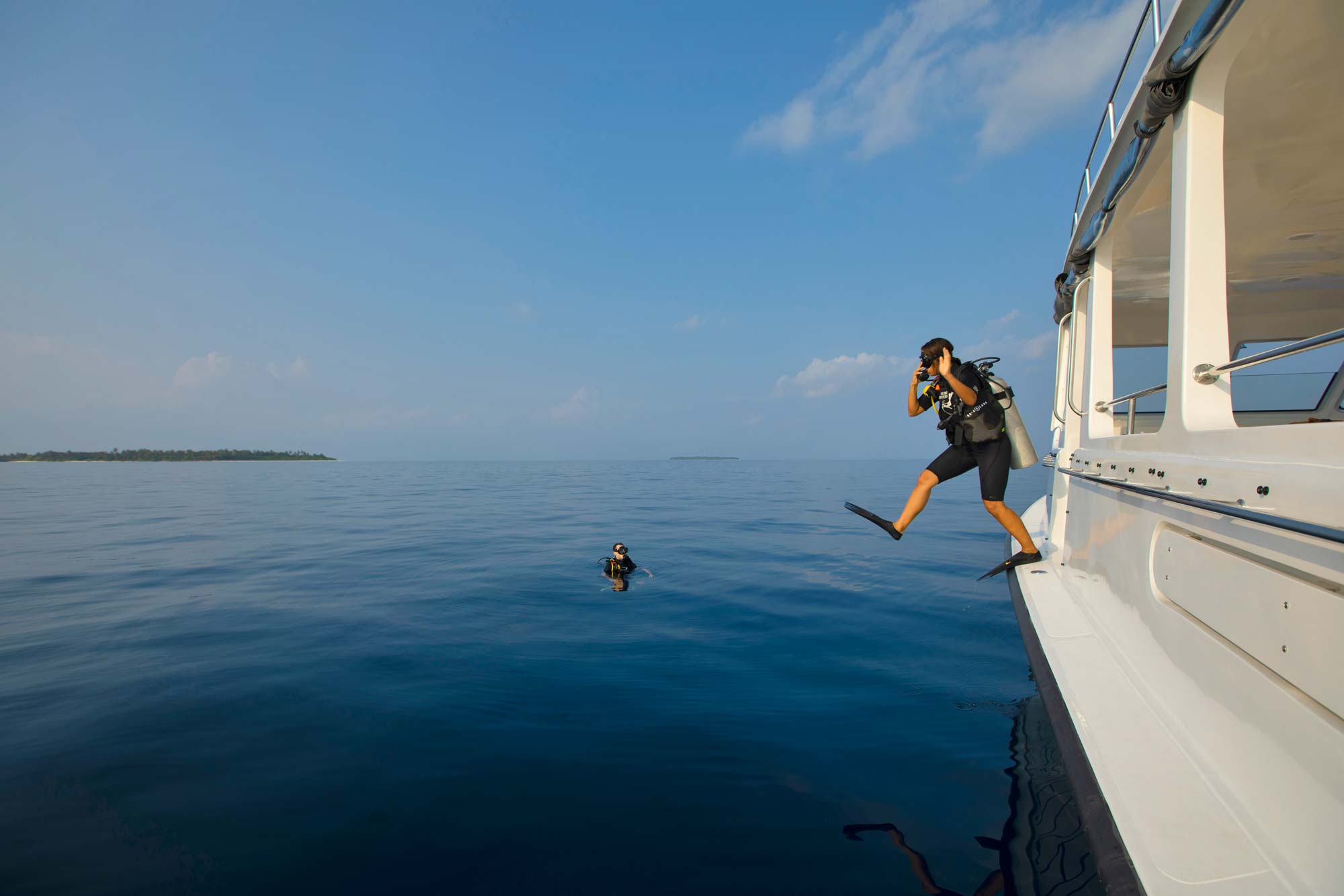 House-reef snorkelling off your deck — the activity/scene in action. An excellent house reef, steps from the overwater villas.