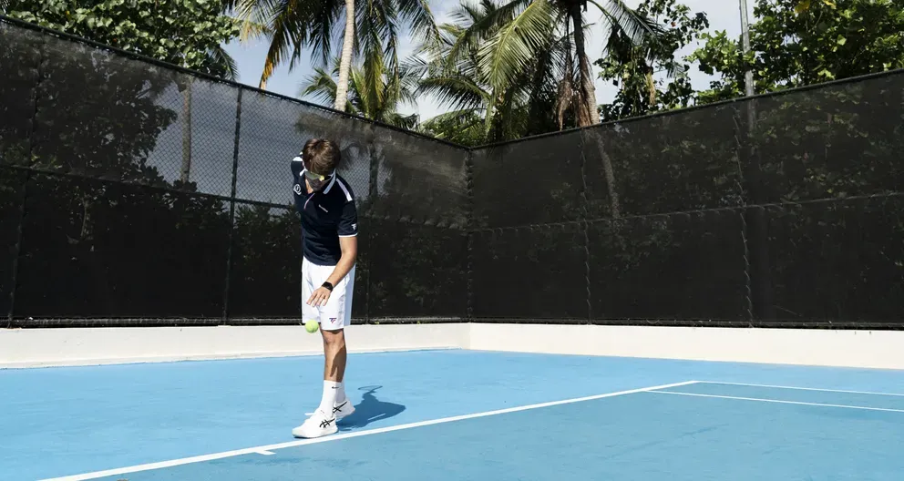 Tennis and the first resort climbing wall — the activity/scene in action. Two championship courts and the first climbing wall of any Maldives resort.