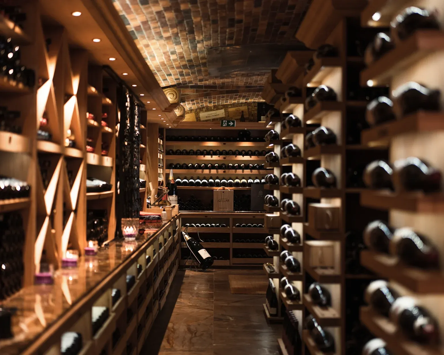 A 25,000-bottle cellar — the activity/scene in action. One of Mauritius's deepest wine lists.
