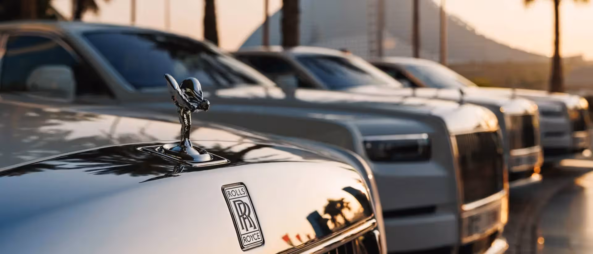 Signature arrival: Rolls-Royce chauffeur or helipad transfer.