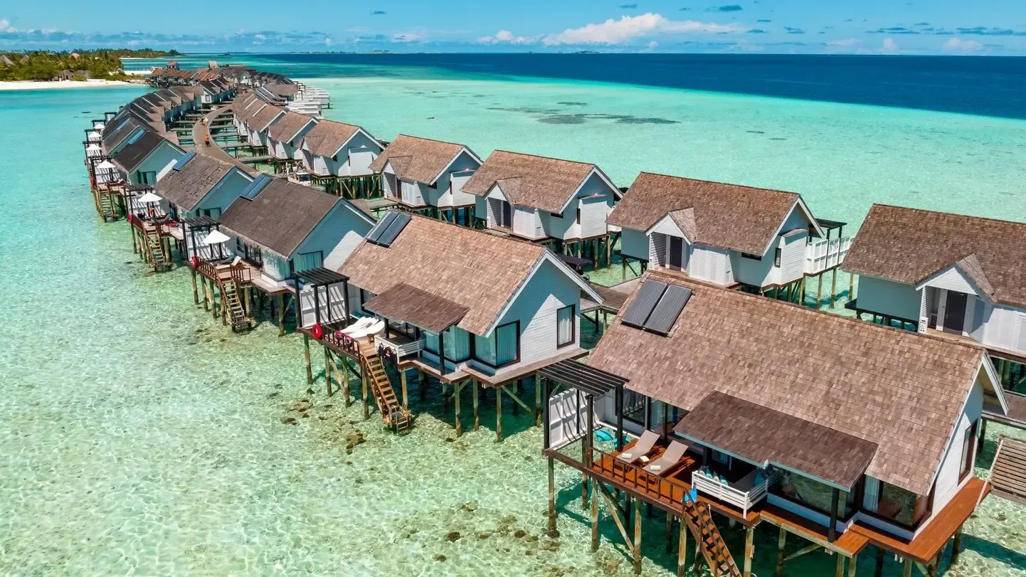 Wind Villas with guaranteed sunsets — the activity/scene in action. Overwater villas with infinity pools facing the sunset.