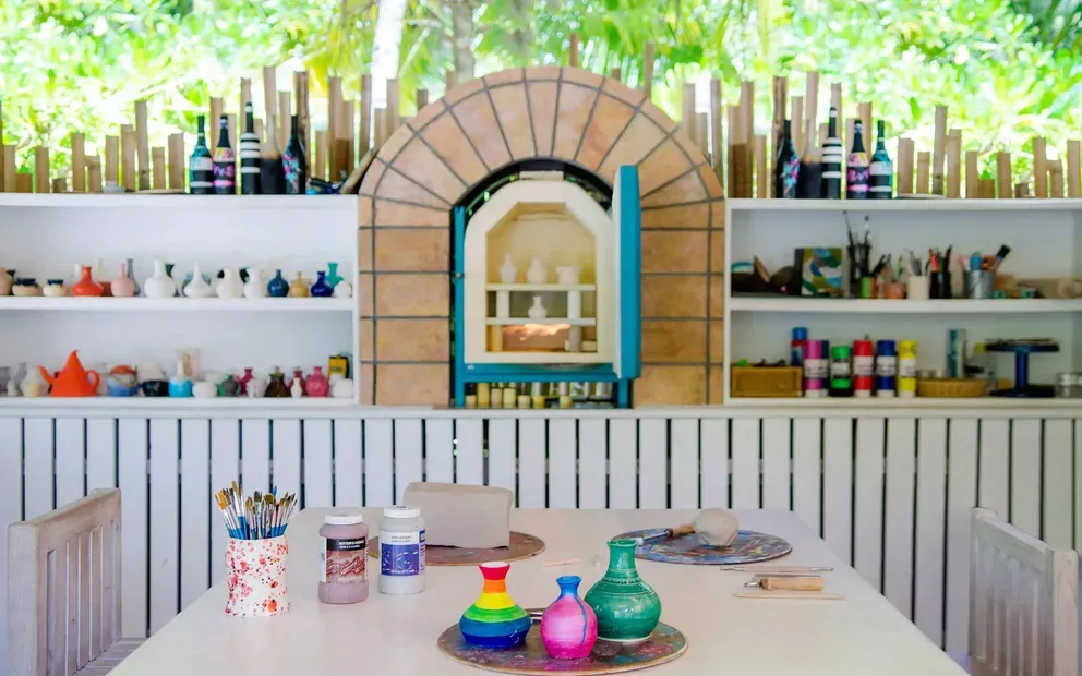 The art studio — the activity/scene in action. A dedicated studio for creative pursuits on the island.