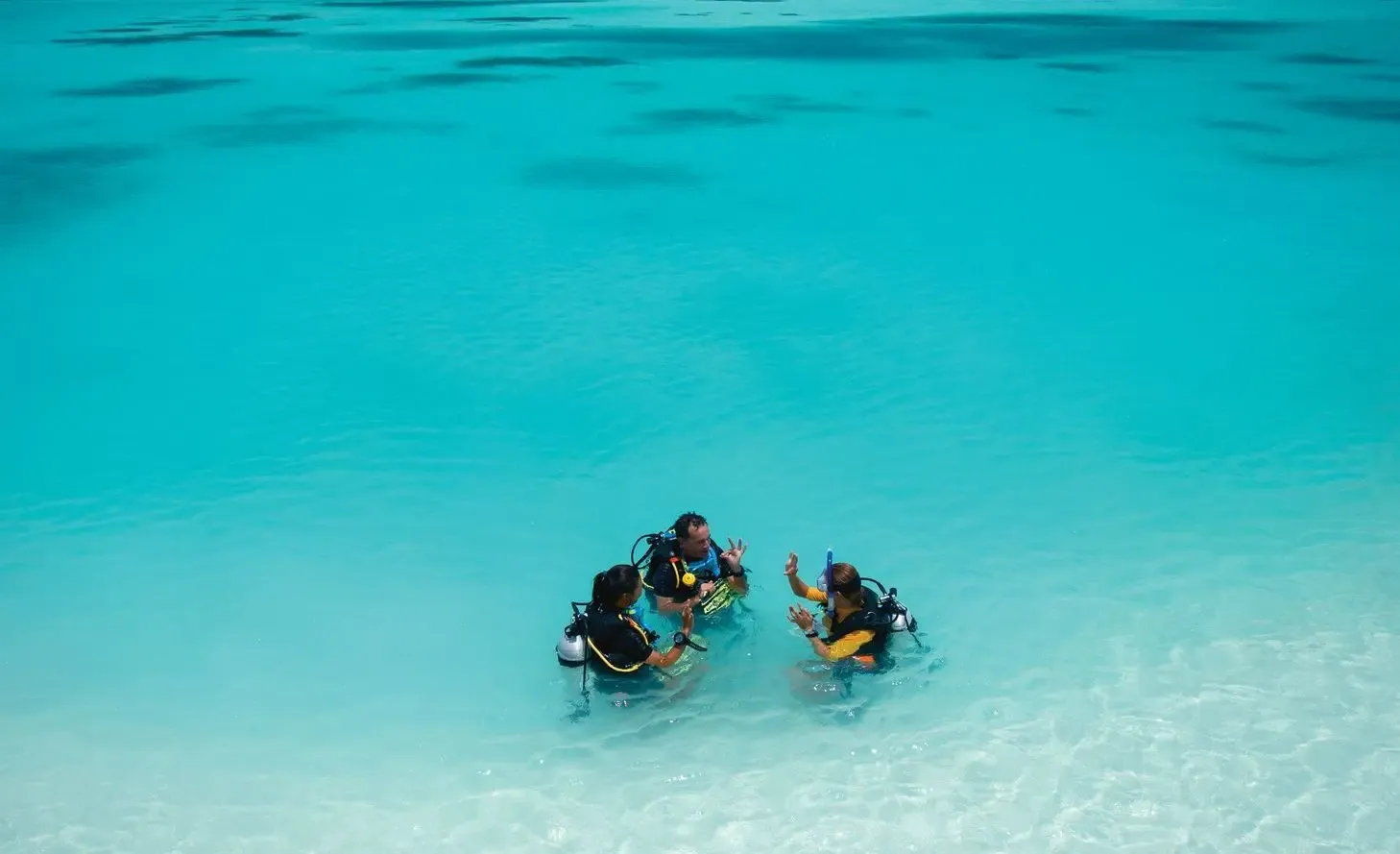 Snorkelling and excursions — the activity/scene in action. Reef snorkelling and excursions included on longer stays.