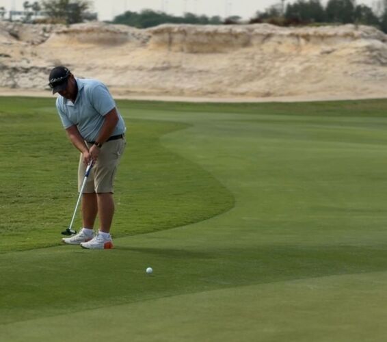 Adjacent golf: Steps away.