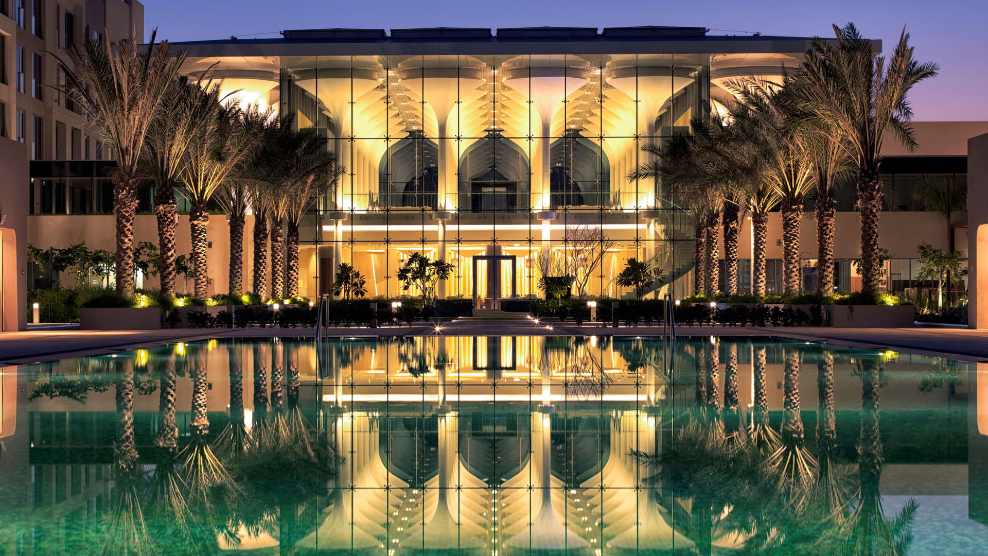Hero/establishing shot of Kempinski Hotel Muscat, Muscat, Oman. A contemporary beach resort in the Al Mouj waterfront community — the ‘new heart of Muscat’ — with a direct private beach, a marina and championship golf within walking distance.
