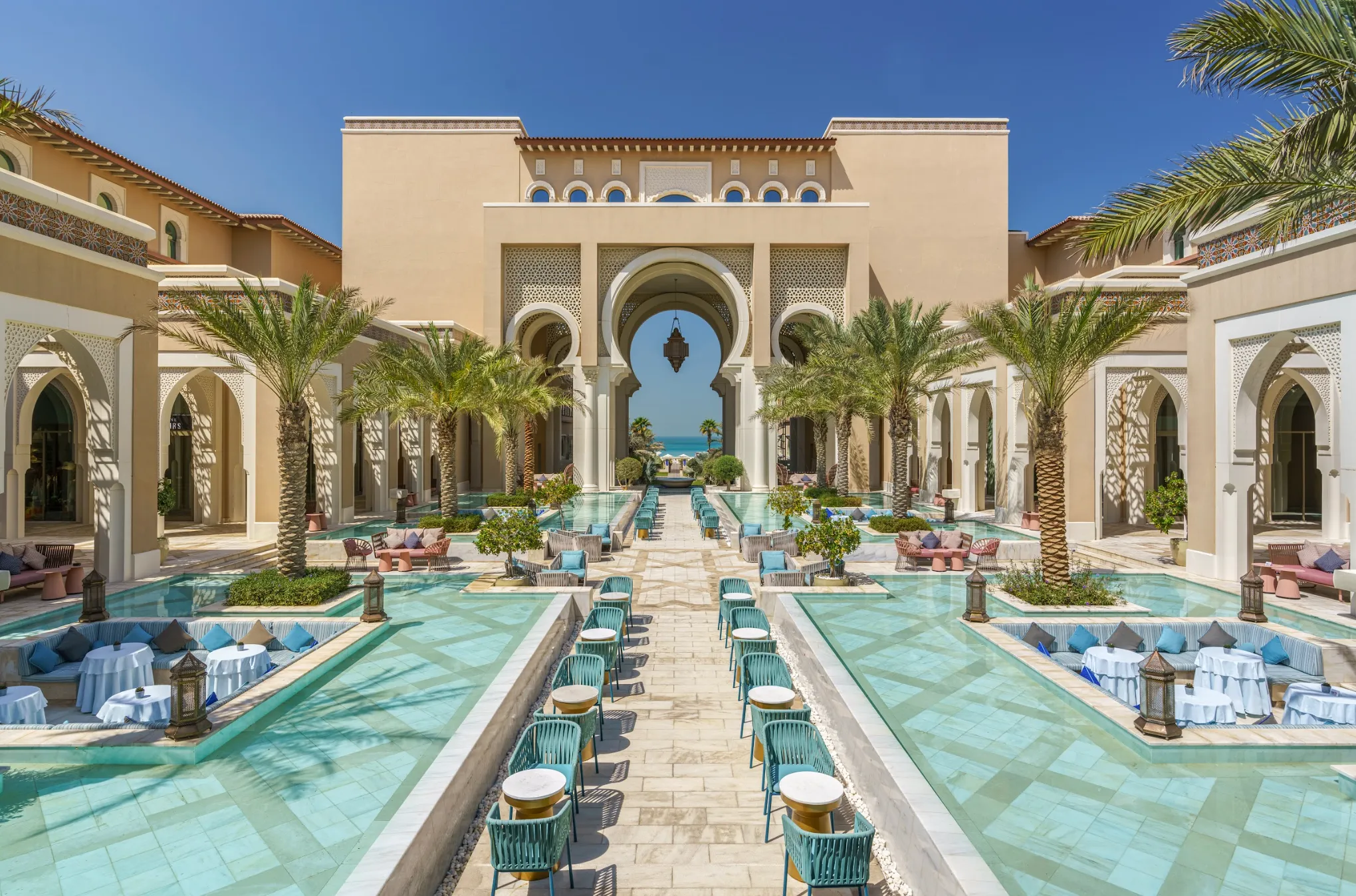 Hero/establishing shot of Rixos Premium Saadiyat Island, Abu Dhabi. An ultra-all-inclusive Ottoman-Mediterranean palace resort on Saadiyat Island’s protected hawksbill-turtle nesting beach, minutes from the Louvre Abu Dhabi.