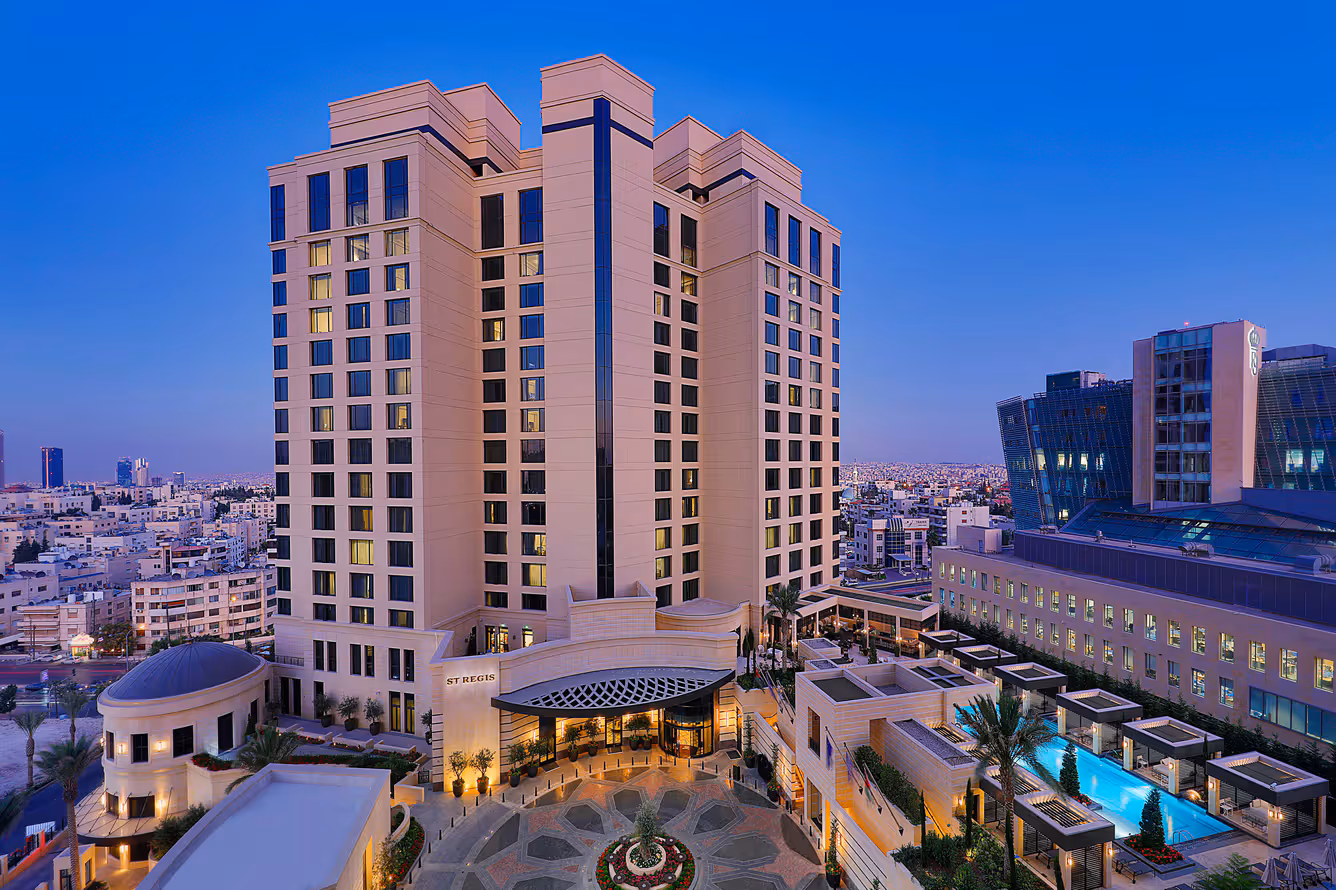 Hero/establishing shot of The St. Regis Amman, Amman, Jordan. Amman’s city icon — a new luxury hotel in the affluent Abdoun district with signature St Regis butler service and a curated Jordanian and Levant art collection.