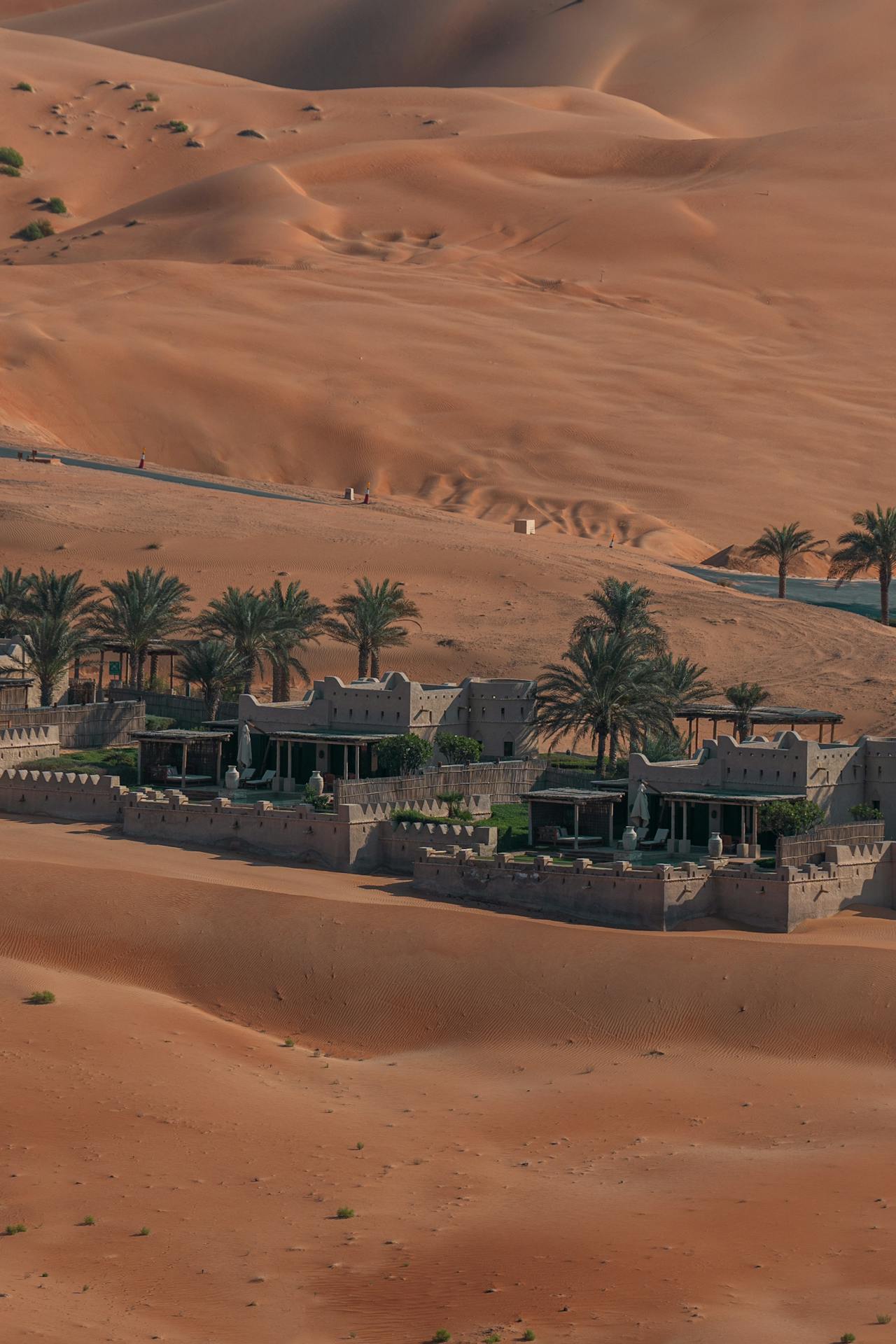 Two hours south, the dunes of the Empty Quarter rise among the tallest in the world