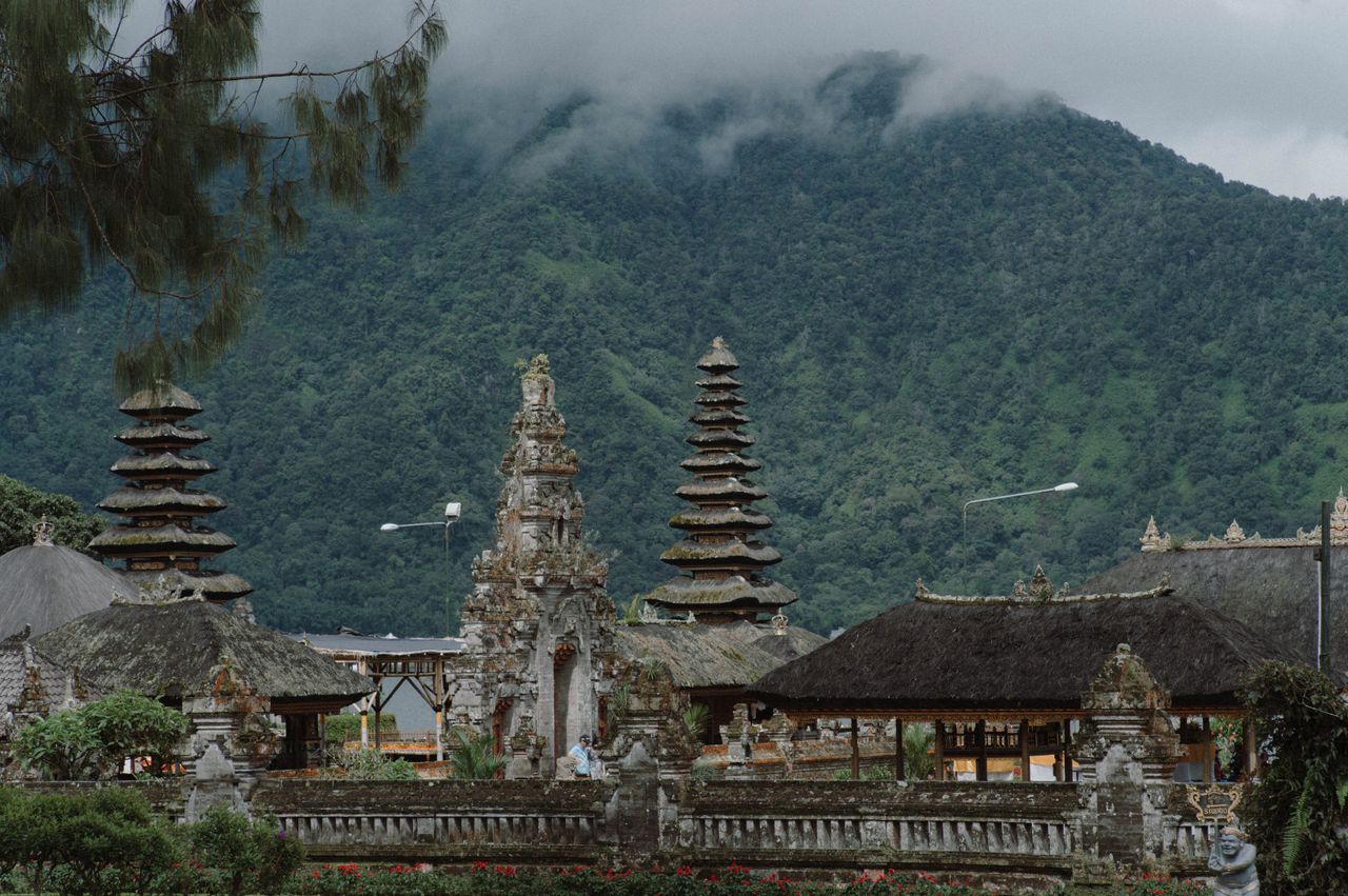 The clifftop Uluwatu and sea temple of Tanah Lot at sunset, daily offerings on every doorstep