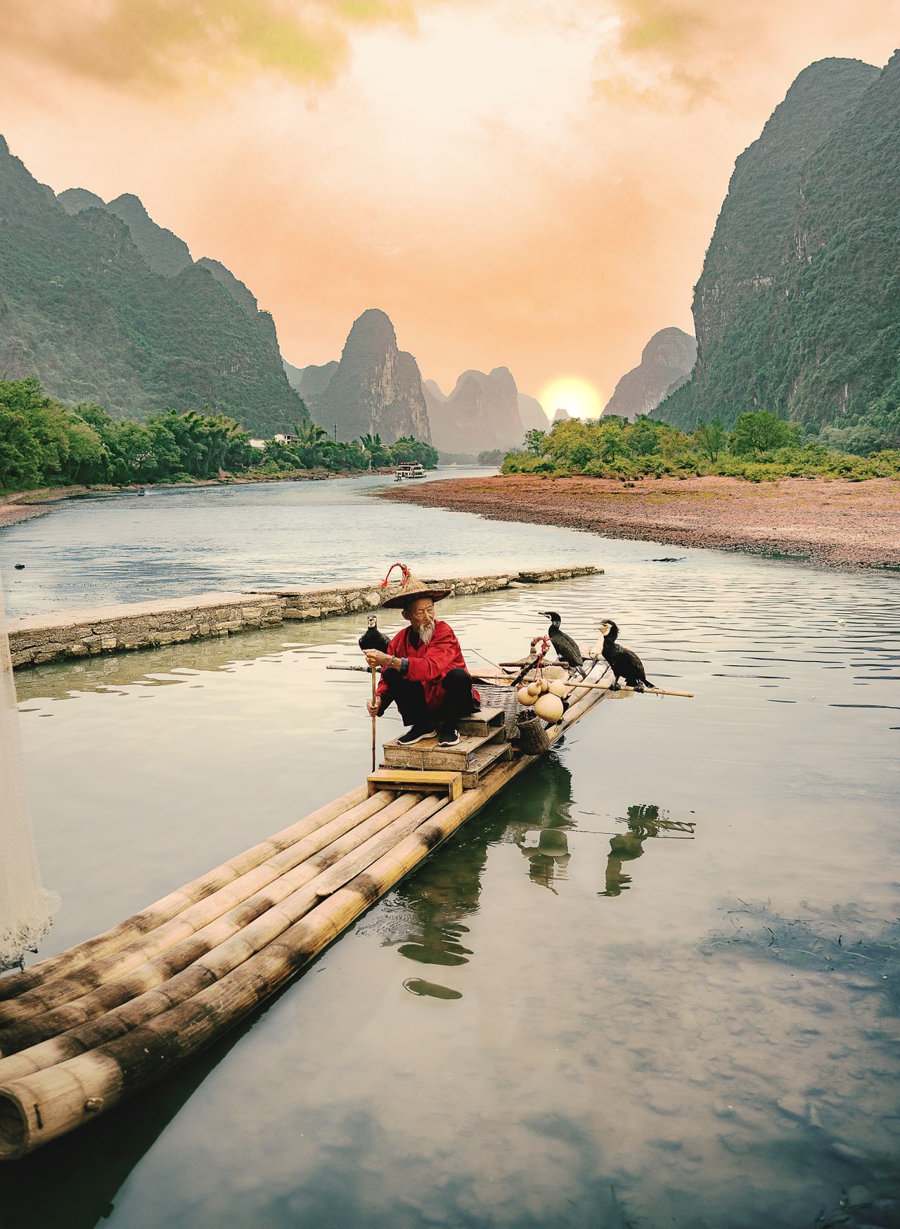 A cruise on the Li River past the karst peaks that fill every Chinese scroll painting