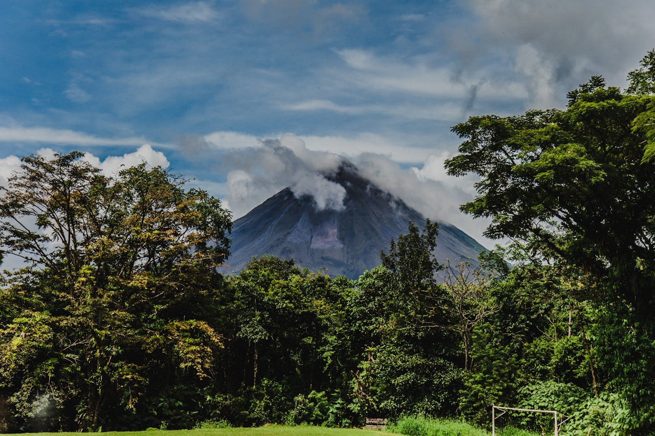 The near-perfect cone of Arenal above the rainforest