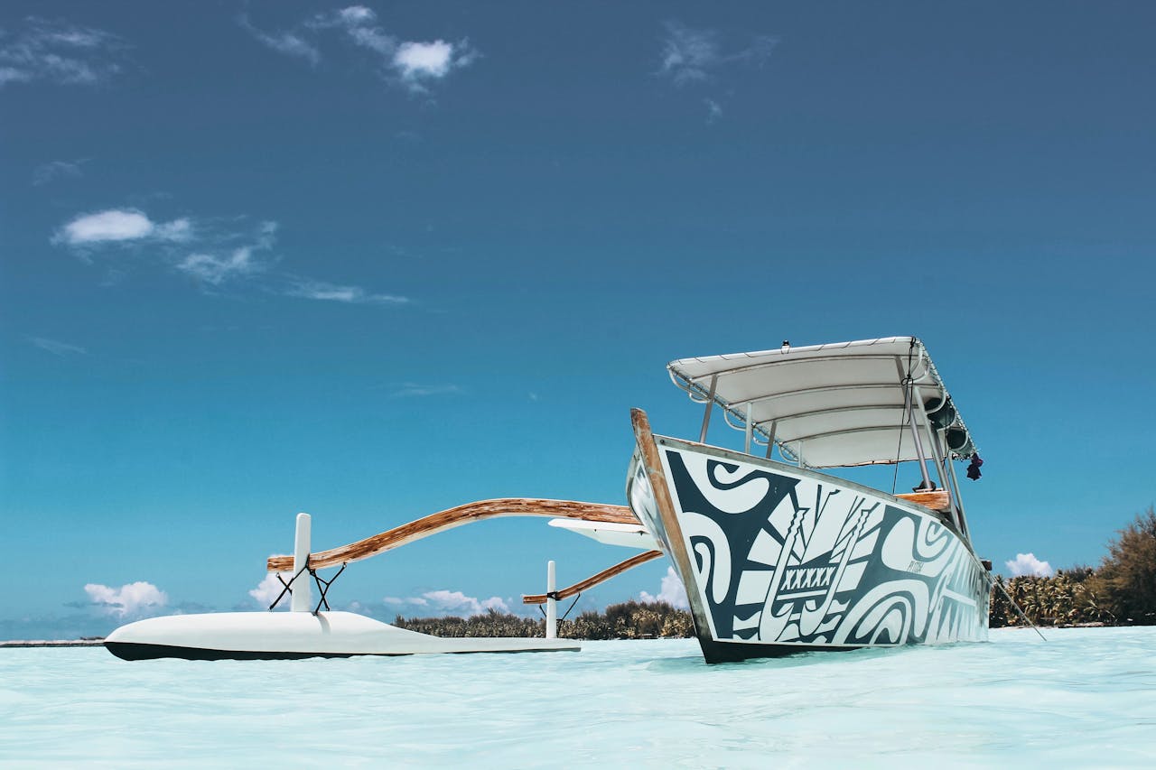 A small-ship or catamaran cruise linking the Society Islands