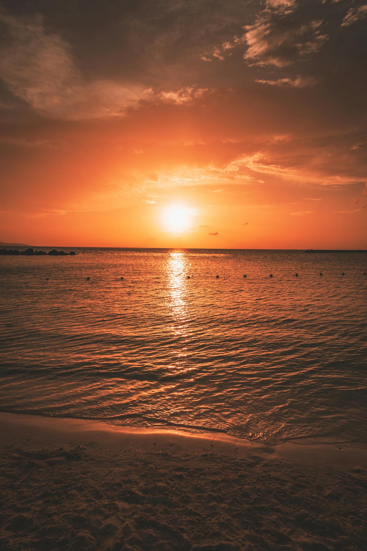 The west coast's long ribbon of white sand and calm water, famous for its sunsets and the cliff bars of…