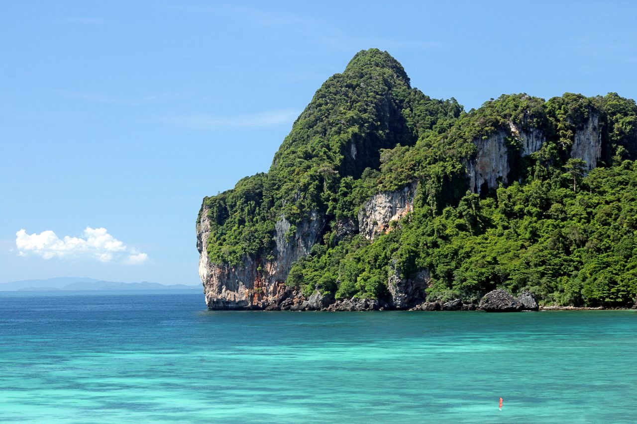 The limestone karsts of Phang Nga Bay, the beaches of Krabi and Phuket, and island days by longtail