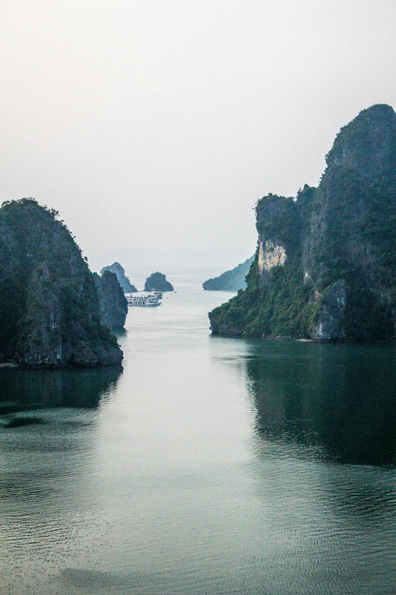 Thousands of limestone towers rise from jade-green water